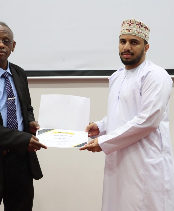 Dean of the College meeting with students and honoring the outstanding students